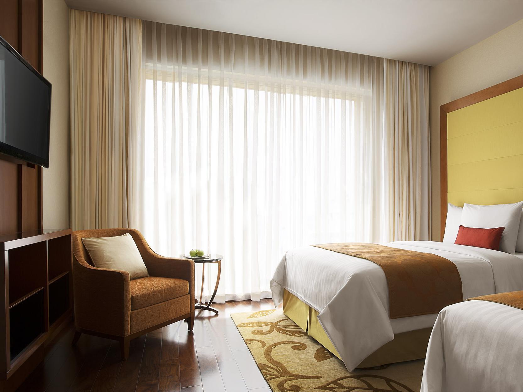 คอร์ตยาร์ด โกชิ แอร์พอร์ต Hotel เนดุมบัสเซรี ภายนอก รูปภาพ A room at the hotel