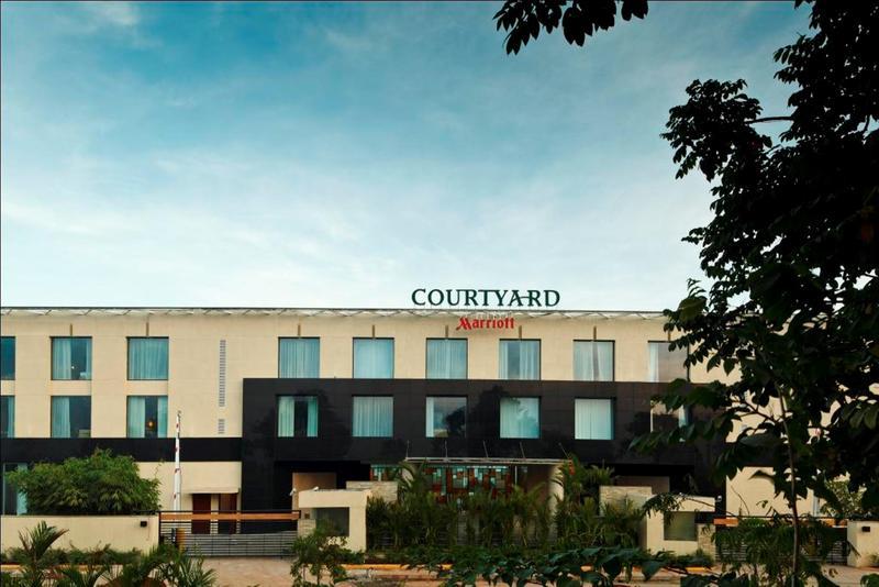 คอร์ตยาร์ด โกชิ แอร์พอร์ต Hotel เนดุมบัสเซรี ภายนอก รูปภาพ Courtyard Marriott, Mysore