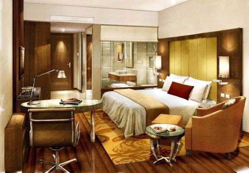 คอร์ตยาร์ด โกชิ แอร์พอร์ต Hotel เนดุมบัสเซรี ห้อง รูปภาพ A room at the Taj Bengal