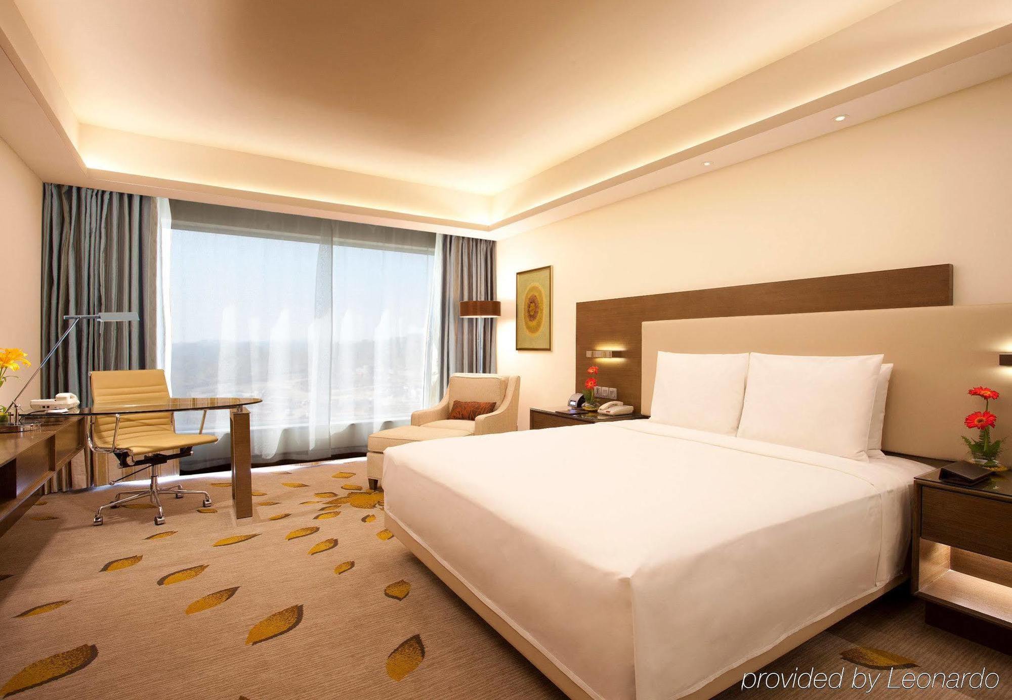 คอร์ตยาร์ด โกชิ แอร์พอร์ต Hotel เนดุมบัสเซรี ภายนอก รูปภาพ Deluxe Room